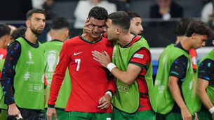 <p>TEARS OF A COD? Portugal's Cristiano Ronaldo is consoled by Diogo Dalot at half-time of extra-time after missing a penalty during the UEFA Euro 2024 match. Pic: Bradley Collyer, PA Wire.</p>