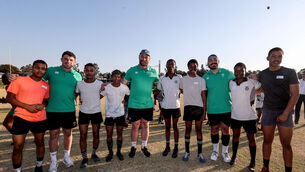 <p>Calvin Nash, Oli Jager and Tom O’Toole with members of The School Of Hard Knocks Rugby team. Pic: Dan Sheridan, Inpho </p>