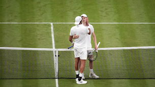 <p>RESPECT: Jannik Sinner with Matteo Berrettini after an entertaining second-round tie at Wimbledon. Pic: Aaron Chown, PA</p>