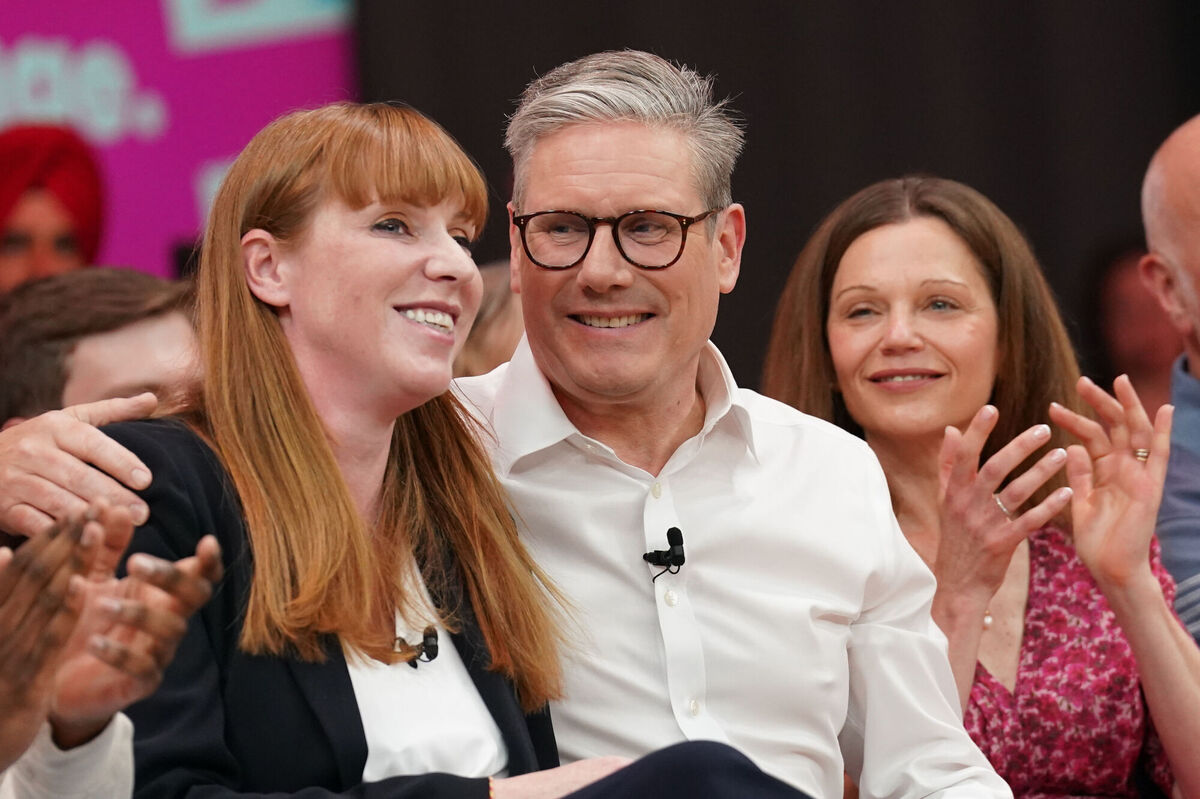 Deputy Labour leader Angela Rayner with Labour leader Keir Starmer and his wife Victoria (right), during a campaign event at the Royal Horticultural Halls in central London. Picture: Stefan Rousseau/PA Wire
