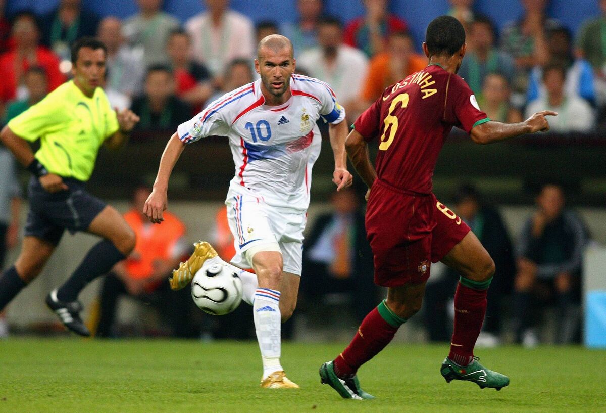 Zinedine Zidane and Francisco Costinho challenge during the World Cup Semi-Final in 2006