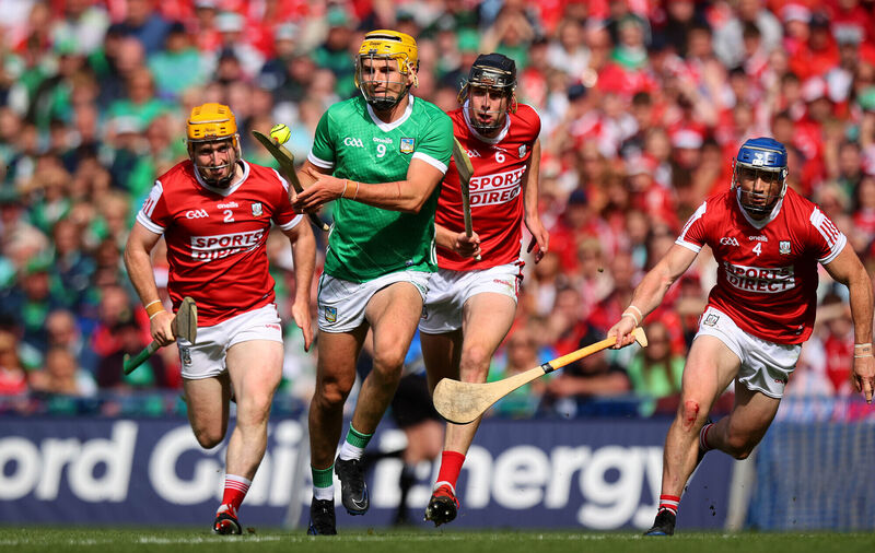 Limerick’s Cathal O’Neill with Niall O' Leary, Robert Downey and Sean O’Donoghue of Cork. Pic Credit ©INPHO/Ryan Byrne