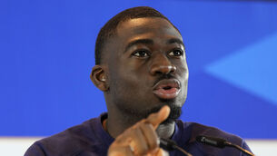<p>France's Youssouf Fofana speaks during a press conference in Paderborn, Germany, Sunday, July 7, 2024. France will play against Spain during their semifinal soccer match at the Euro 2024 soccer tournament on July 9. (AP Photo/Hassan Ammar)</p>