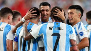 <p>Lionel Messi celebrates with teammates Angel Di Maria and Rodrigo De Paul after scoring in the semi-final against Canada</p>
