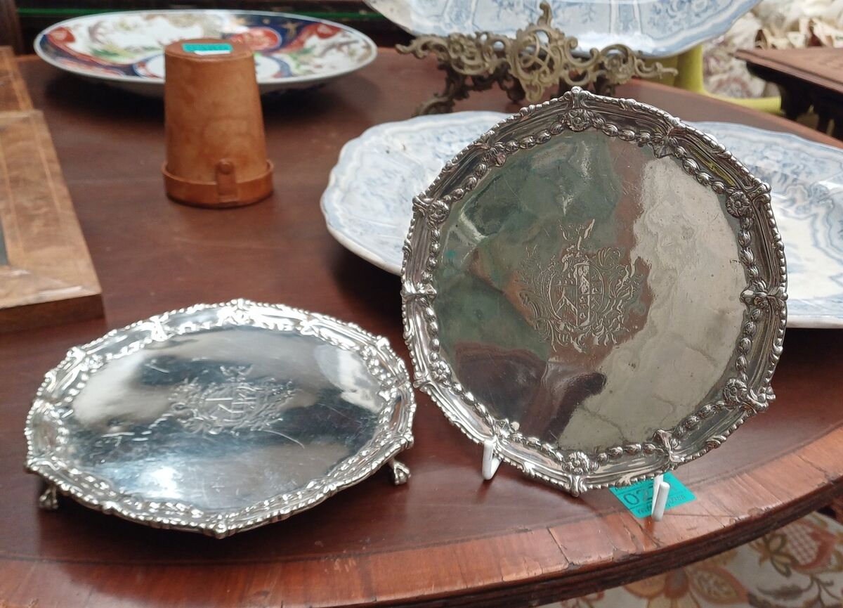 A pair of London silver salvers dated 1771 at Aidan Foley's sale.