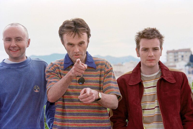 Irvine Welsh, left, in Cannes in 1996 at an event for the film version of Trainspotting, with director Danny Boyle and actor Ewan McGregor. Picture: Patrick HERTZOG / AFP 