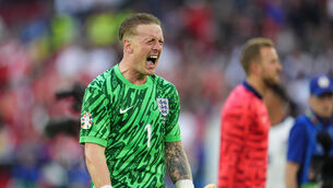 England goalkeeper Jordan Pickford celebrates after the penalty shoot-out win over Switzerland (Adam Davy/PA)