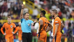 <p>Referee Felix Zwayer shows Netherlands's Denzel Dumfries a yellow card for a foul on England's Harry Kane following a VAR check after awarding a penalty during the UEFA Euro 2024 semi-final. Pic: Nick Potts/PA Wire. </p>