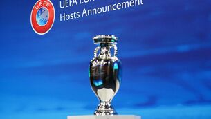 <p>A general view of the European Championship trophy during the Euro 2028 and Euro 2032 hosts announcement ceremony at the UEFA Headquarters in Nyon, Switzerland: up for grabs in the 2024 finals; Sunday, 7pm, RTÉ2</p>