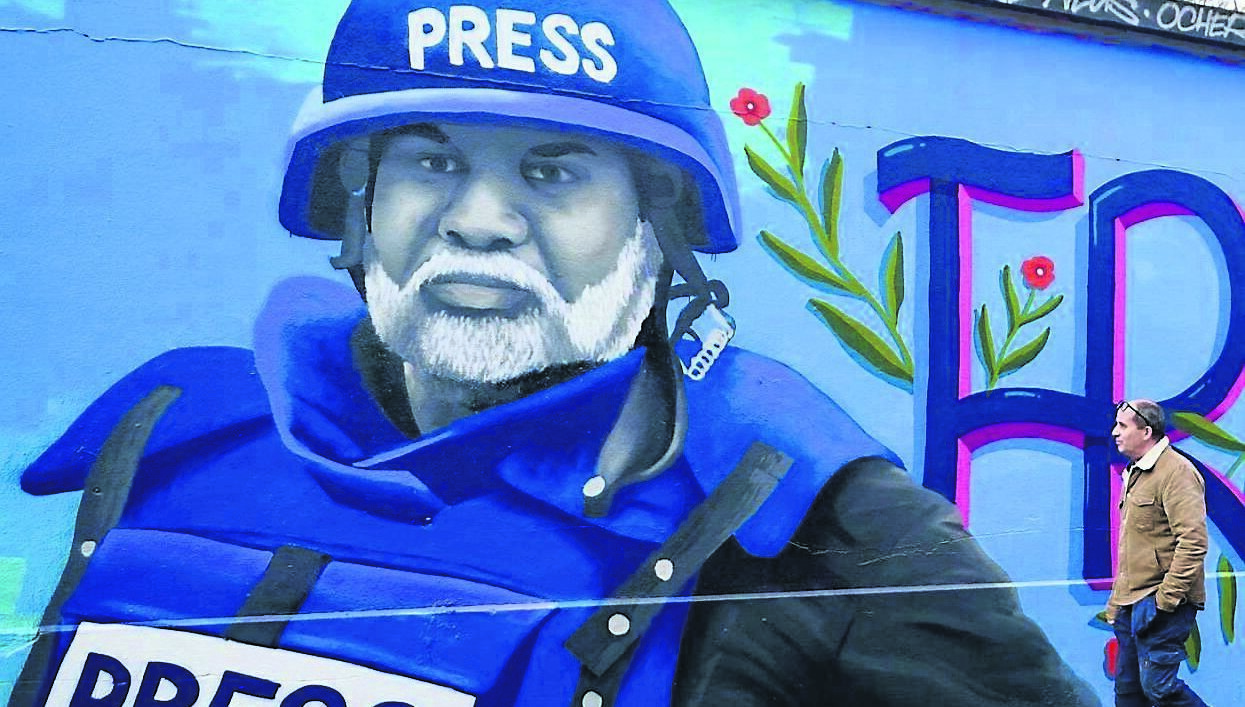 A mural of Wael al-Dahdouh, Al Jazeera's chief correspondent in Gaza, painted by street artist Emmalene Blake, in Dublin. His wife, son, daughter, and grandson were all killed in an Israeli strike.  Picture: Niall Carson/PA Wire