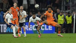 <p>Joshua Zirkzee, right, has joined Manchester United for around £36.5million (Darko Vojinovic/AP)</p>