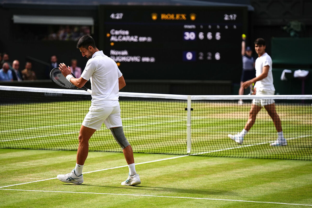 Novak Djokovic applauds a shot from Carlos Alcaraz. Photo credit: Aaron Chown/PA Wire. Novak Djokovic applauds a shot from Carlos Alcaraz. Photo credit: Aaron Chown/PA Wire.