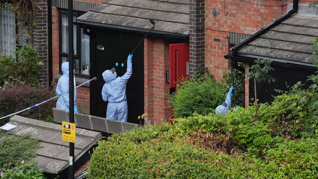 <p>Forensic officers at an address in Shepherd's Bush, west London, after human remains were found in two suitcases near the Clifton Suspension Bridge in Bristol Picture: Jonathan Brady/PA Wire</p>