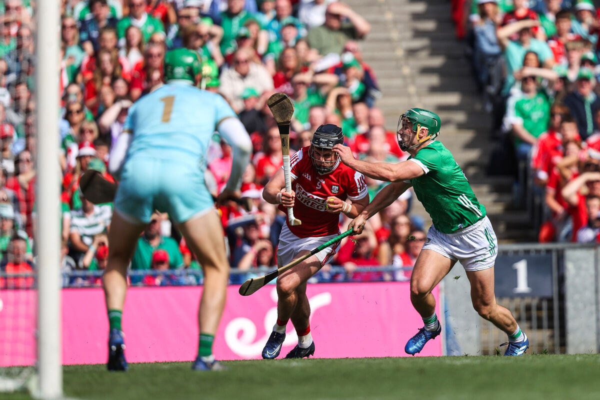 Cork's Darragh Fitzgibbon and Sean Finn of Limerick battle. Pic: ©INPHO/Bryan Keane