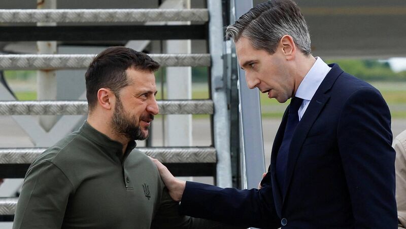 Taoiseach Simon Harris greets the Ukrainian president, Volodymyr Zelenskyy, at Shannon Airport during his visit on July 13, 2024. Picture: Clodagh Kilcoyne/Reuters