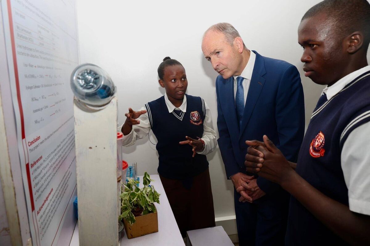 Student scientists explain their project to Tánaiste Micheál Martin at the launch in Nairobi of Young Scientist Kenya, supported by Ireland and based on the Young Scientist and Technology Exhibition. 