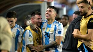 <p>Argentina's midfielder Enzo Fernandez and Lionel Messi celebrate their team's first goal during the Copa America final against Colombia. Picture: JUAN MABROMATA/AFP via Getty Images</p>