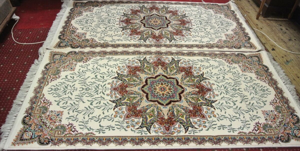 A pair of Iranian rugs at Woodward's.