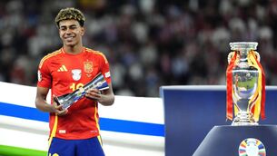 <p>Spain's Lamine Yamal with the Best Young Player of the Tournament trophy</p>