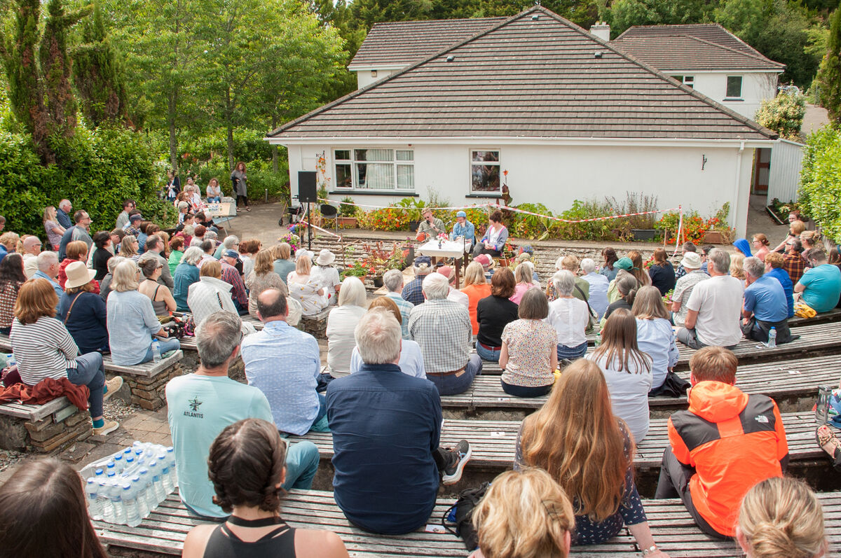 'As we wait for the arrival of authors Kevin Barry and Colin Barrett and discussion prodder Maeve Higgins, there’s even volunteers handing out bottled water for people who might be uncomfortable in the heat.' Picture: Karlis Dzjamko