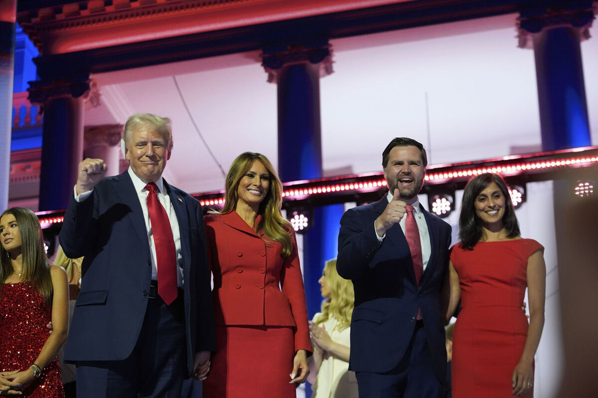 Republican presidential candidate and former president, Donald Trump, and Republican vice presidential candidate Sen. JD Vance, R-Ohio, watch with their families as the balloons fall during the final day of the Republican National Convention Thursday, July 18, 2024, in Milwaukee. Picture: AP Photo/Paul Sancya