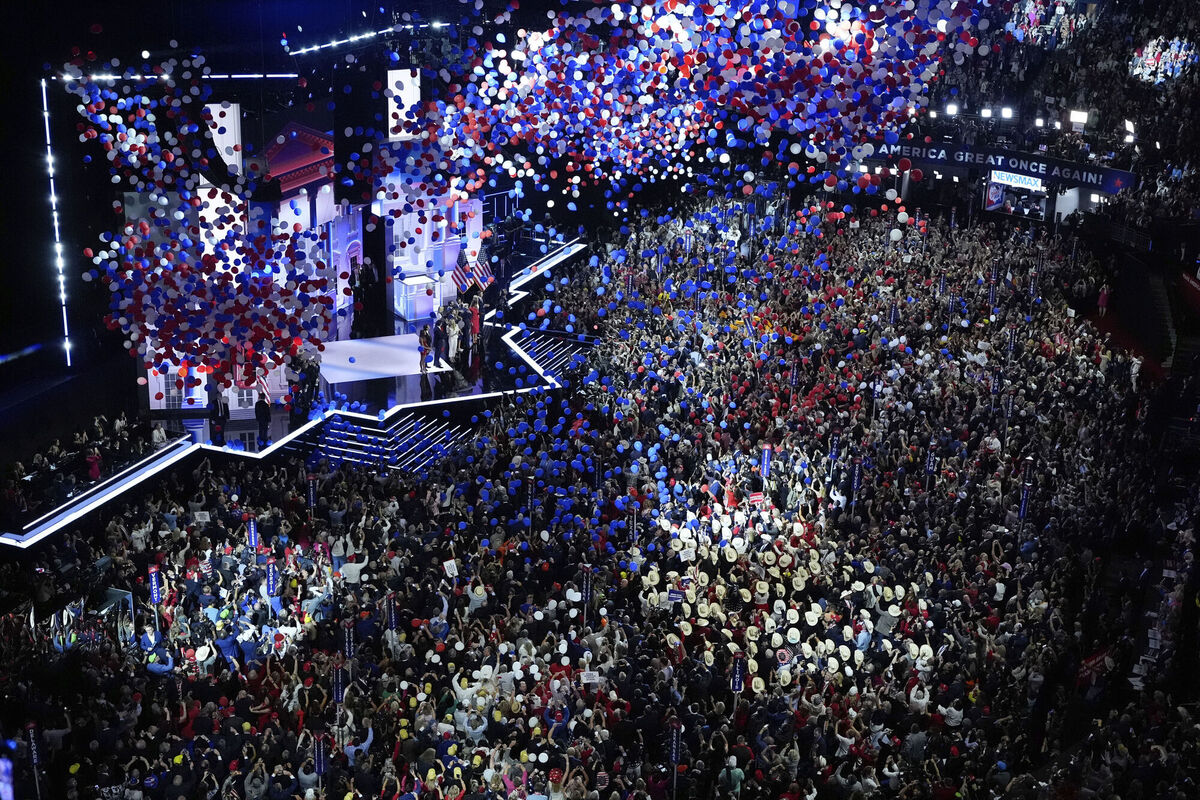Republican presidential candidate and former president, Donald Trump, and Republican vice presidential candidate Sen. JD Vance, R-Ohio, watch with their families as the balloons fall during the final day of the Republican National Convention Thursday, July 18, 2024, in Milwaukee. Picture: AP Photo/Nam Y. Huh