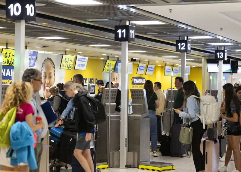 Check-in desks at Ryanair start to build in Dublin Airport Terminal 1 as a major cyber problem affects many airlines and and companies around the world. Picture: Collins Check-in desks at Ryanair start to build in Dublin Airport Terminal 1 as a major cyber problem affects many airlines and and companies around the world. Picture: Collins