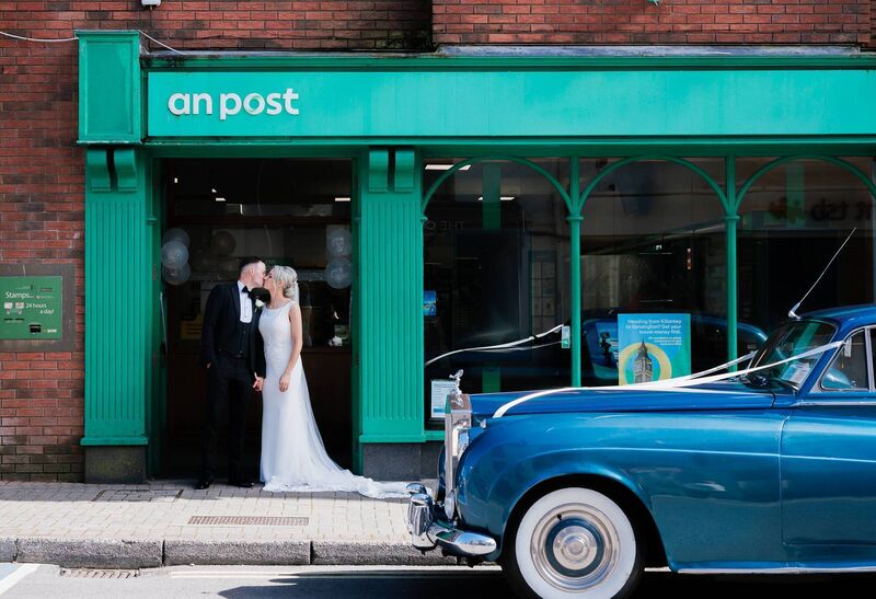 Sealed with a kiss: Amanda Lyne and Alan MacSweeney at An Post, Killarney Post Office, New Street. Pictures: Dylan Clifford 