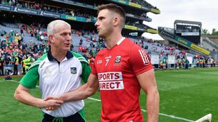 <p>Limerick manager John Kiely with Eoin Cadogan of Cork after the 2021 All-Ireland SHC final. Photo by Ray McManus/Sportsfile</p>