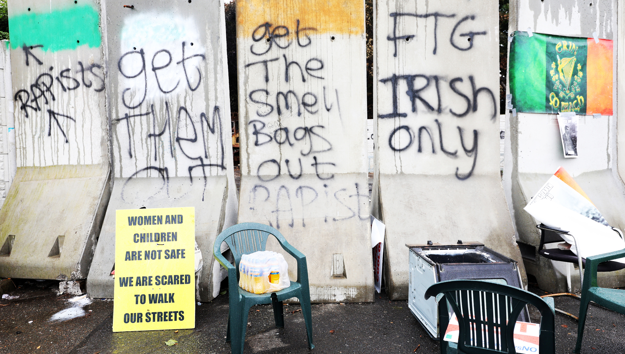 Injured garda remains in hospital after unrest and fire in Coolock 