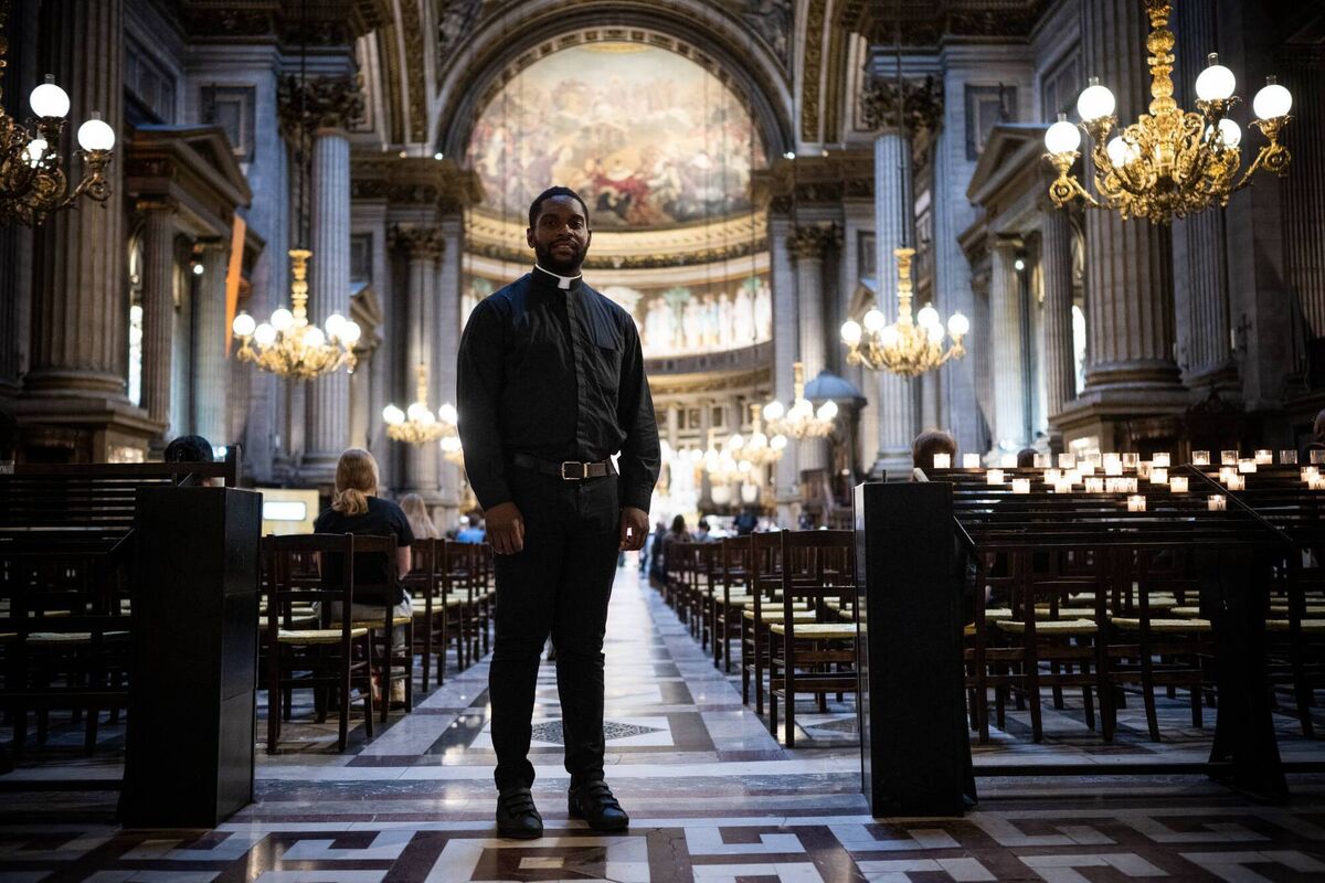 Former judoka and French priest Jason Nioka, in charge of training the Catholic chaplains who will accompany the athletes in the Olympic Village, poses in the Madeleine church in Paris, on July 16, 2024. (Photo by JULIEN DE ROSA / AFP) (Photo by JULIEN DE ROSA/AFP via Getty Images)