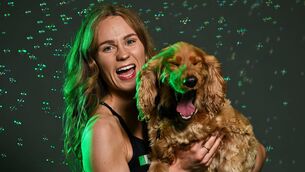 <p>IN AT THE DEEP END:; Swimmer Ellen Walshe with her Cocker Spaniel Barley. Photo by Sam Barnes/Sportsfile </p>