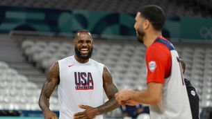 <p>AMERICAN DREAM: LeBron James, jokes with Jayson Tatum. Pic: Michael Conroy, AP</p>
