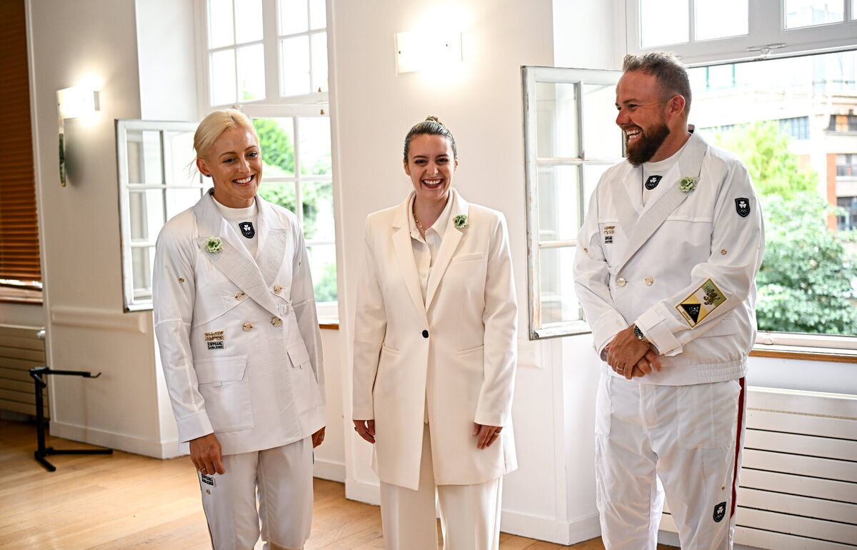 The Irish team will wear suits designed by Irish designer Laura Weber in the ceremony that takes place later today on the River Seine in Paris. Pictured with Sarah and Shane is designer Laura Weber. Photo by Sam Barnes/Sportsfile