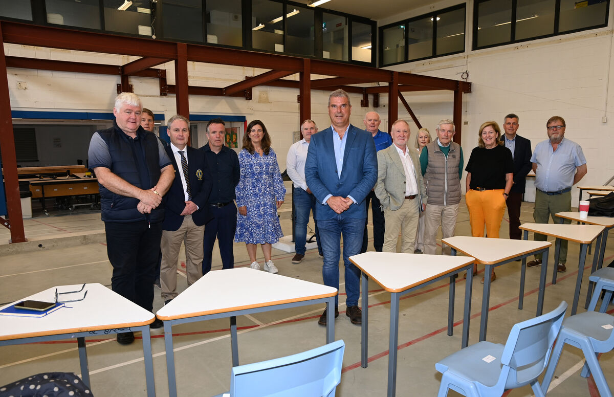 Fergal McCarthy (blue suit), the principal Kinsale community college with various representatives from the local community in the hall which will converted into a 400-seat theatre. Picture: Eddie O'Hare Fergal McCarthy (blue suit), the principal Kinsale community college with various representatives from the local community in the hall which will converted into a 400-seat theatre. Picture: Eddie O'Hare