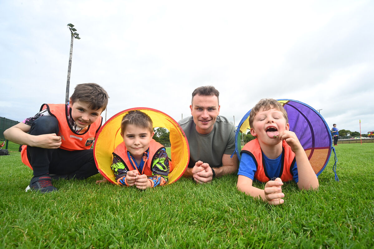 Volunteer Colm Spillane with boys Jude, Donnacha, and Finn who were having fun at the three-day Cúl Eile summer camp at Castlelyons GAA Club organised by The Friends of Dean & Padraig. Volunteer Colm Spillane with boys Jude, Donnacha, and Finn who were having fun at the three-day Cúl Eile summer camp at Castlelyons GAA Club organised by The Friends of Dean & Padraig.