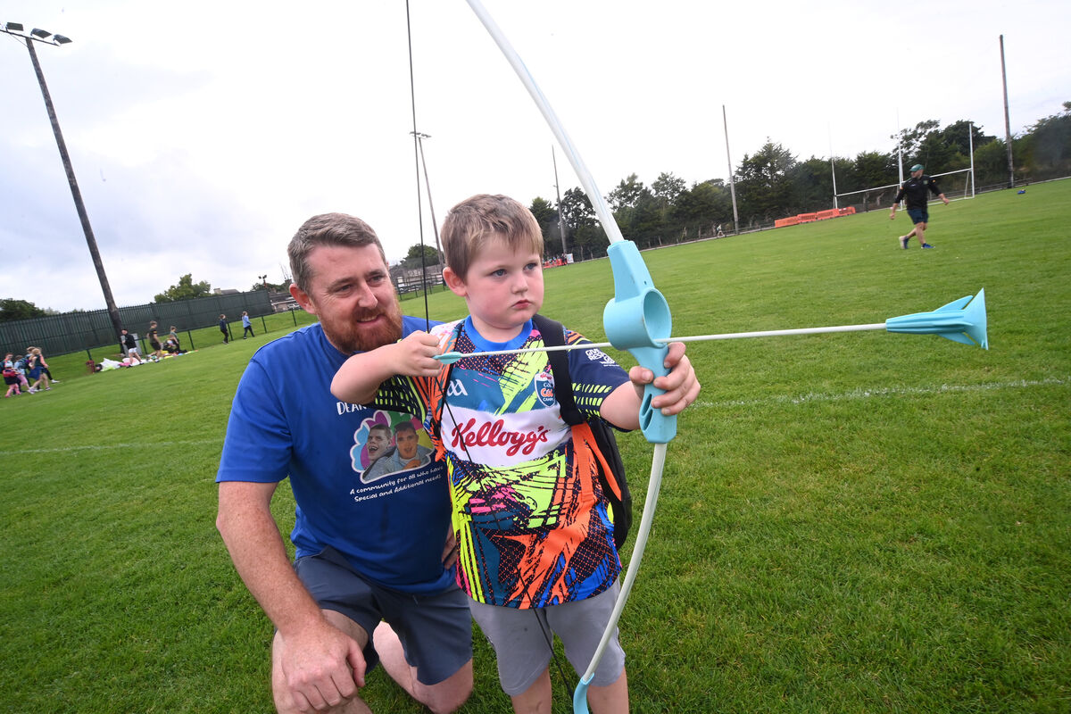 Simon and Mikey Barry enjoying archery at the Cúl Eile summer camp at Castlelyons GAA Club. Simon and Mikey Barry enjoying archery at the Cúl Eile summer camp at Castlelyons GAA Club.