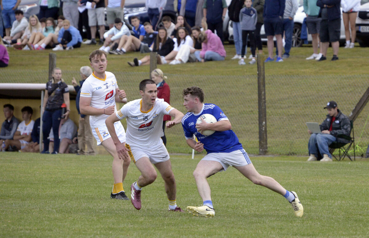 Bandon's Darren Crowley tackling Naomh Aban's Dara Mickey Ó Loingsigh. Picture Denis Boyle Bandon's Darren Crowley tackling Naomh Aban's Dara Mickey Ó Loingsigh. Picture Denis Boyle