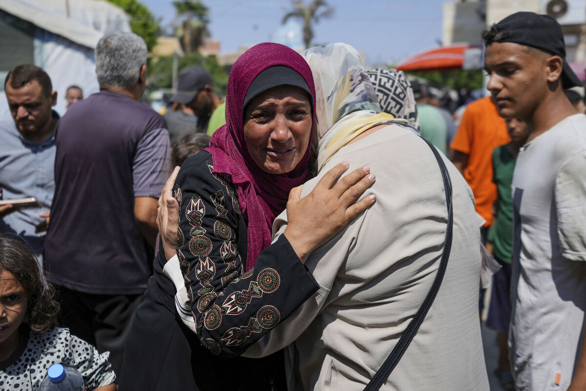 A Palestinian woman mourns her nephew, killed in the Israeli bombardment of the Gaza Strip, at a hospital in Deir al-Balah, Saturday, July 27, 2024. (AP Photo/Abdel Kareem Hana)