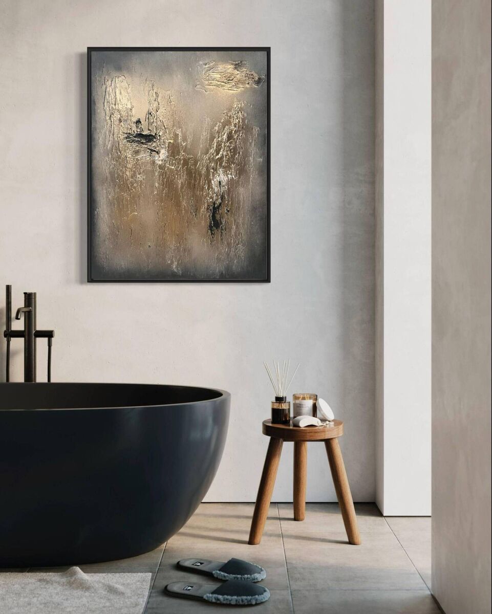 Think about art in places other than high-traffic areas in the home. The Luz with its moody tones and gold accents ties in with the black bathtub for a coherent interior design. Think about art in places other than high-traffic areas in the home. The Luz with its moody tones and gold accents ties in with the black bathtub for a coherent interior design.