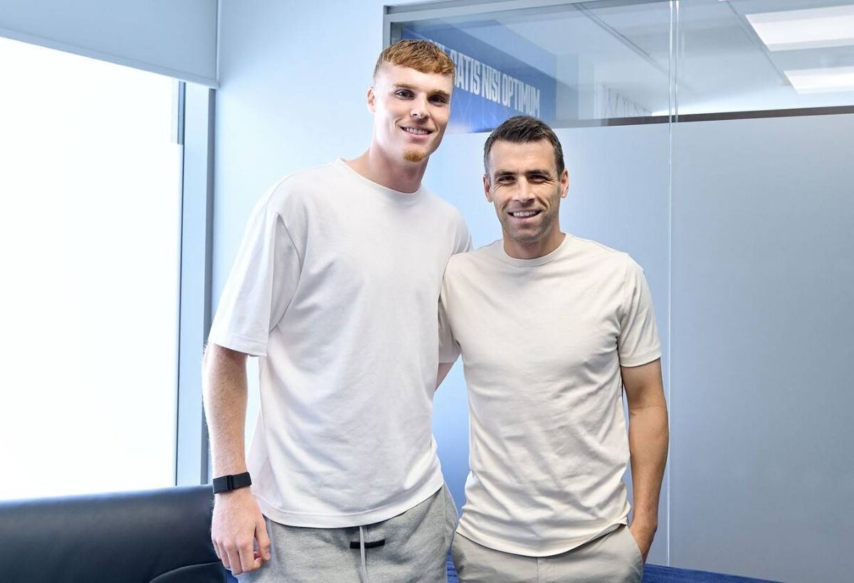 Jake O'Brien with Seamus Coleman.