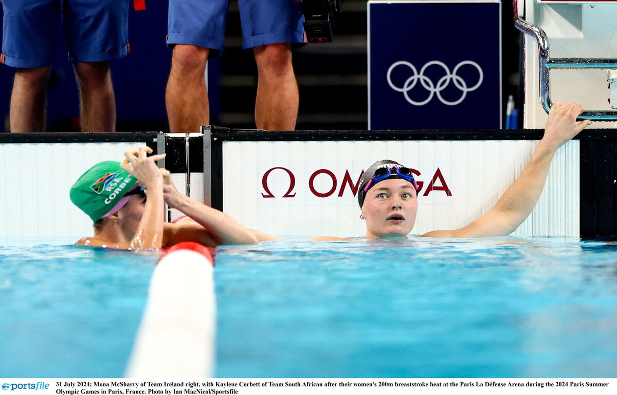 Mona McSharry with Kaylene Corbett of Team South Africa after their women's 200m breaststroke heat. Pic: Ian MacNicol/Sportsfile
