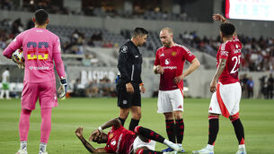<p>GROWING LIST: Marcus Rashford (ground) was the latest Manchester United player to suffer an injury during the club’s pre-season tour of the United States. Pic: Derrick Tuskan/PA</p>