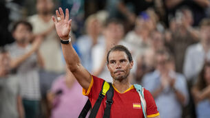 Rafael Nadal waves goodbye to Court Philippe Chatrier (Manu Fernandez/AP)