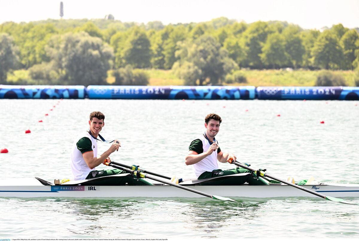 Philip Doyle, left, and Daire Lynch of Team Ireland celebrate after winning bronze in the men's double sculls A final. Pic: Stephen McCarthy/Sportsfile