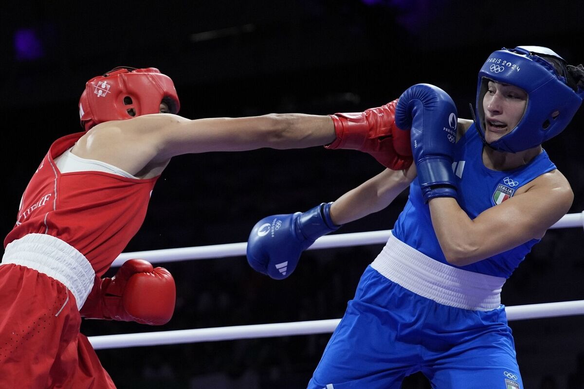 Algeria's Imane Khelif, left, fights Italy's Angela Carini. Picture: AP Photo/John Locher
