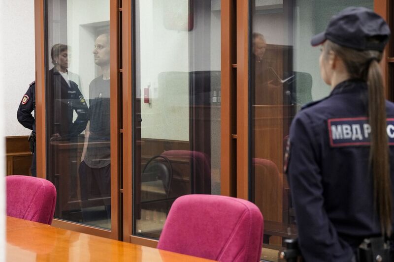 Wall Street Journal reporter Evan Gershkovich stands in a glass cage in a courtroom in Yekaterinburg, Russia, Wednesday, June 26, 2024. Picture: AP Photo/Dmitri Lovetsky