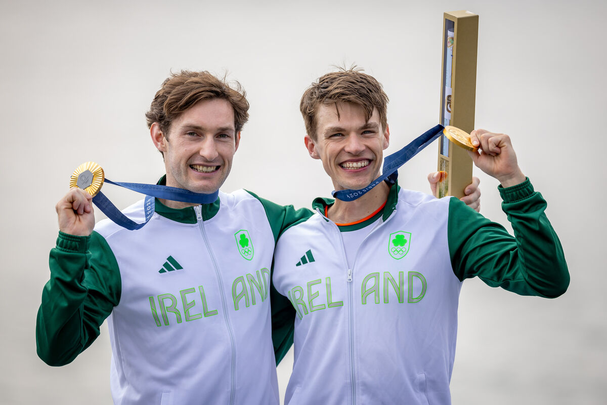 The Skibbereen men show off their gold medals