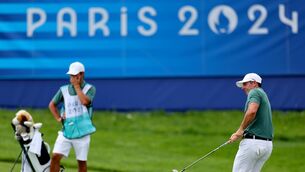 <p>Rory McIlroy reacts to a chip shot on the 17th. Picture: ©INPHO/James Crombie</p>