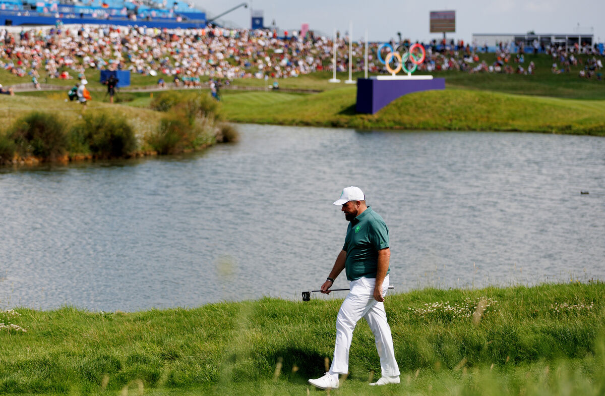 Lowry walks to the 16th hole Lowry walks to the 16th hole